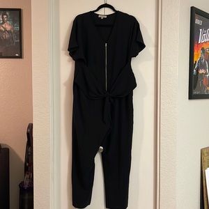 Black v neck beautiful romper with belt attachment